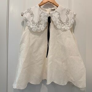 Sister Jane Cream Top with Silver Embellishments.